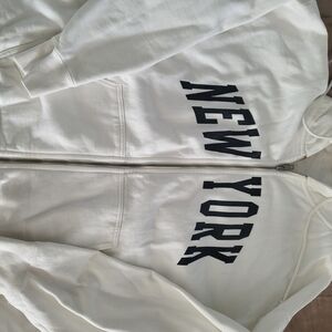 Brandy Melville White Zip-Up Hoodie with Black Print